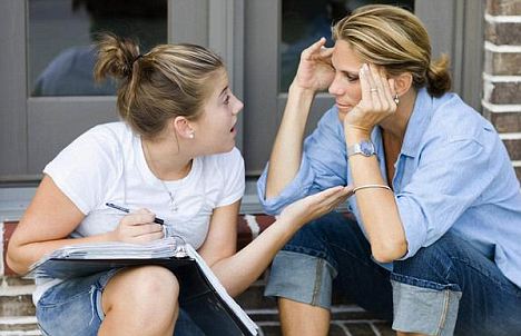 Teenage Daughter Arguing With Mother on Porch --- Image by © Kevin Dodge/Corbis